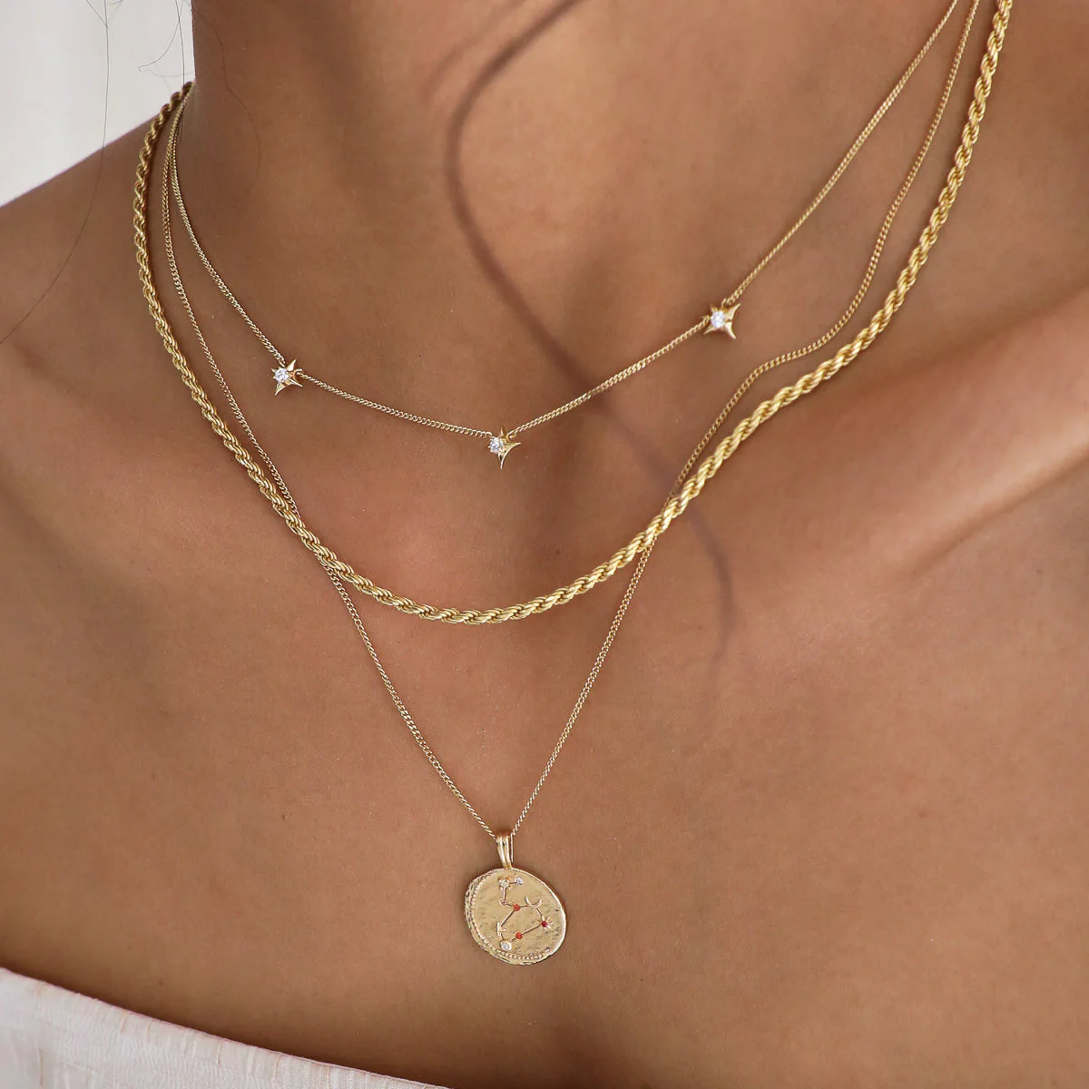 Cosmic Star Charm Necklace in Gold - Image 5